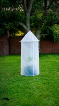 Load image into Gallery viewer, Tree Defender 6' Standard Tree Defender. The white mesh cover has a secured top and secured around the base.
